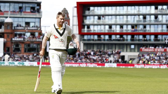 David Warner walks off after being dismissed by Stuart Broad on Saturday.