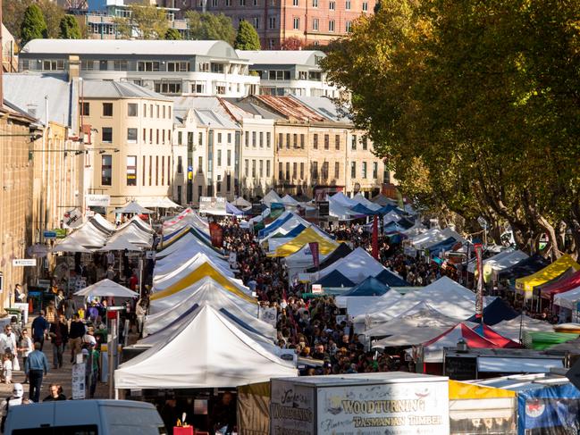 Set among the historic Georgian sandstone buildings of Salamanca Place in Hobart, this famous market attracts thousands of locals and visitors every Saturday of the year.Photo - Alastair BettESCAPE 15 May 2022TOP GEAR