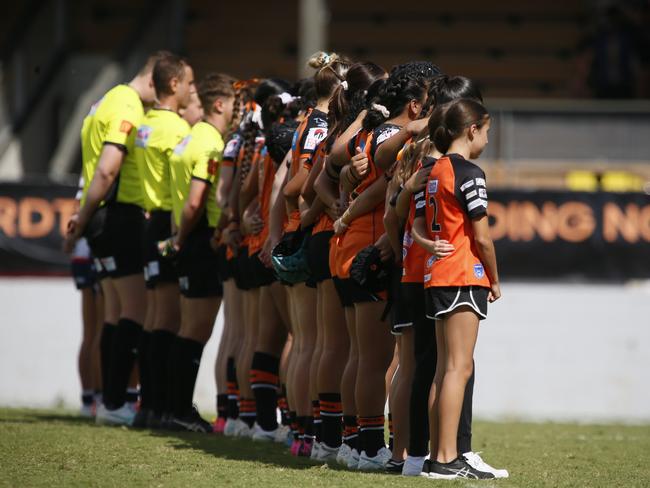 Tigers players line up in a pre-game tribute to Keith Barnes. Picture: Warren Gannon Photography