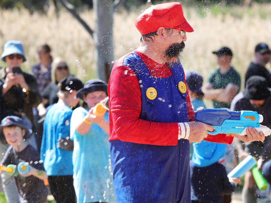 Water pistol fun to finish the event wth Mario aka Marcus Hughes who competes in the event in memory of his son Daniel who died of cancer Picture: Mark Wilson