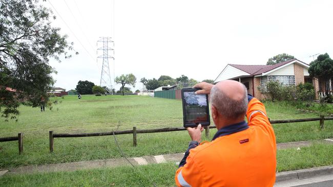 Five hundred metres of wires came down across backyards and houses. Picture: Richard