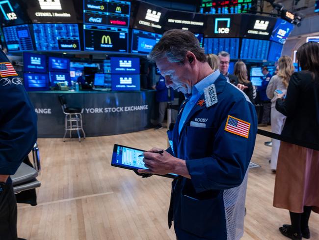 NEW YORK, NEW YORK - MARCH 03: Traders work on the New York Stock Exchange (NYSE) floor on March 03, 2025 in New York City. Despite growing concerns over proposed tariffs and continued tension with Ukraine, stocks rose on Monday, with the Dow up 70 points.   Spencer Platt/Getty Images/AFP (Photo by SPENCER PLATT / GETTY IMAGES NORTH AMERICA / Getty Images via AFP)