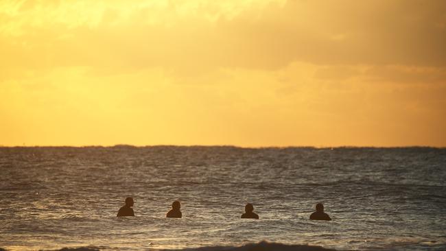 Surfers at Lennox Head / Picture: Dylan Robinson