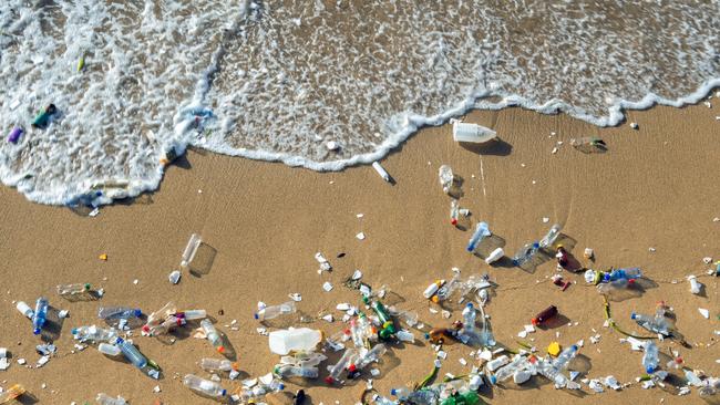 Plastic waste polluting a beach.