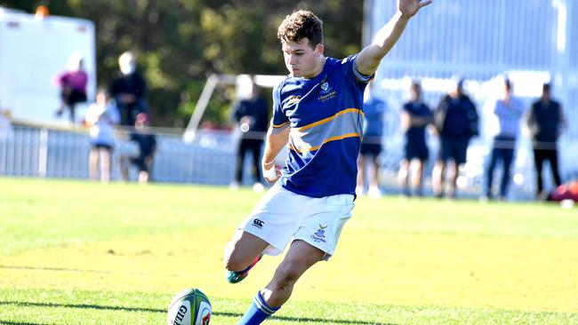 Churchie player Archie Wilson kicks for goal. Picture, John Gass