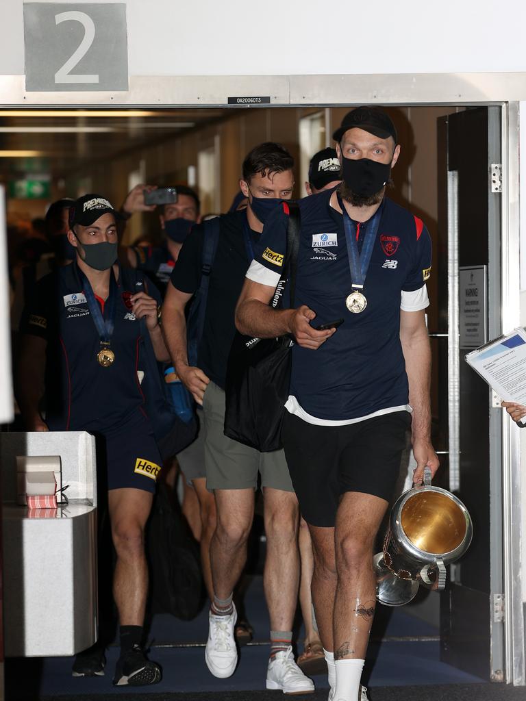 Gawn disembarks with Dees players. Picture: Getty Images