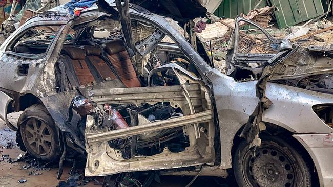 The car in which three sons of Hamas leader Ismail Haniyeh were killed in an Israeli air strike is pictured in al-Shati camp, west of Gaza City. Picture: AFP.