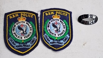 NSW Police badges were found. NSW Police.