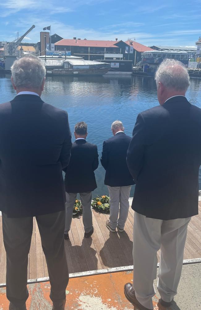 Friends of two sailors killed during the Sydney to Hobart gather for a tribute at Constitution dock in Hobart.