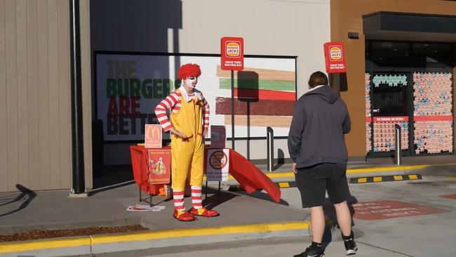 YouTuber 'Floppy' has raided eyebrows with a pop-up 'McRonald's' store outside Hungry Jack's stores. Picture: Floppy/ YouTube