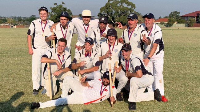 Avondale Heights players celebrate their NWMCA premiership in 2018-19.