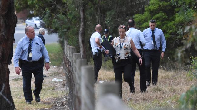 Police and SES crews in Bundoora Park. Picture: Tony Gough