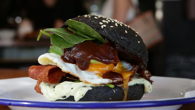 Egg and bacon roll with a difference — Rukus’ lump of coal roll. Photos: Martin Lange.