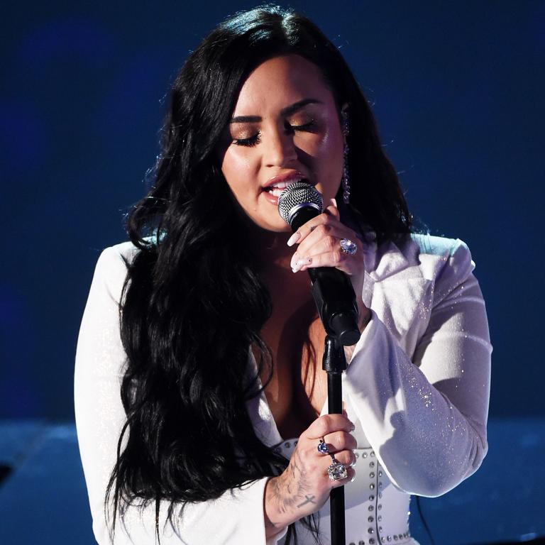 Demi Lovato Covers Up Lip Print Tattoo With New Rose Ink- PopStarTats