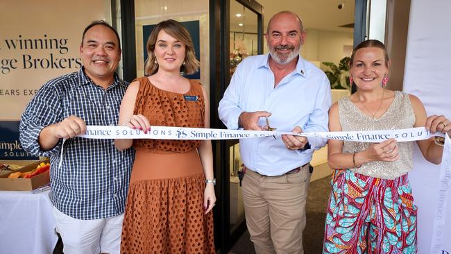 NT Treasurer Bill Yan cut the ribbon to officially open the office.