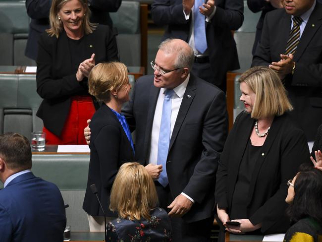 Liberal MP for Higgins Katie Allen is congratulated by Australian Prime Minister Scott Morrison after delivering her first speech in the House of Representatives in 2019.