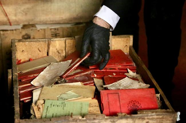 The crates contained Nazi-themed postcards, photographs, progapanda material, notebooks and party membership documents