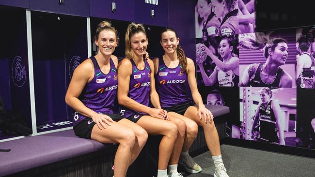 Queensland Firebirds stars Gabi Simpson, Kim Ravaillion, and Ruby Bakewell-Doran in the club's new 'inclusive' uniforms ahead of the 2023 Team Girls Cup. Picture: Supplied.