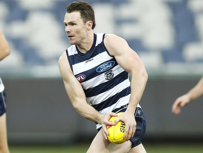 GEELONG, AUSTRALIA - JULY 04: Patrick Dangerfield of the Cats runs with the ball during the round 5 AFL match between the Geelong Cats and the Gold Coast Suns at GMHBA Stadium on July 04, 2020 in Geelong, Australia. (Photo by Daniel Pockett/Getty Images)