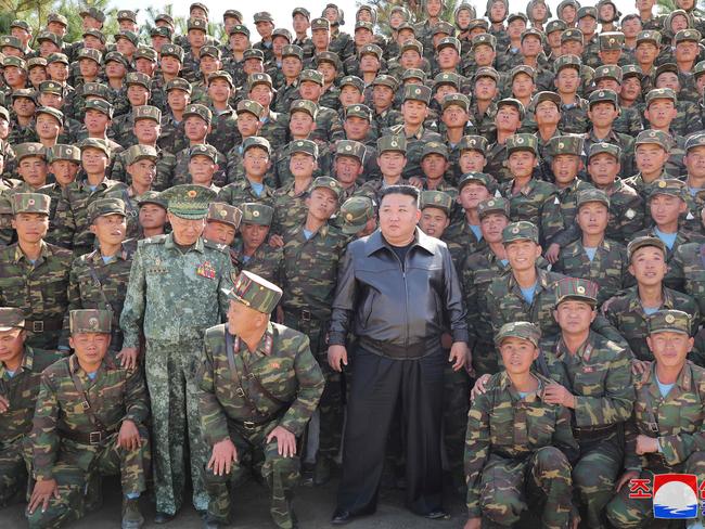 North Korea's leader Kim Jong-un (C) posing with troops during an inspection at a training base of the Korean People's Army. Thousand of his troops will go to Russia. Picture: AFP