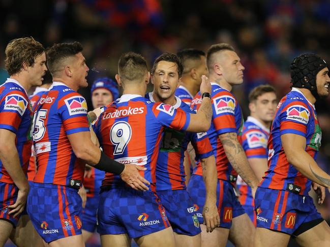 NEWCASTLE, AUSTRALIA - JULY 13:  Mitchell Pearce of the Knights celebrates his try with team mates during the round 18 NRL match between the Newcastle Knights and the Parramatta Eels at McDonald Jones Stadium on July 13, 2018 in Newcastle, Australia.  (Photo by Ashley Feder/Getty Images)