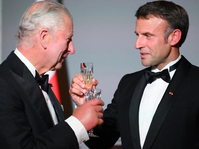 French President Emmanuel Macron toasts King Charles during a state banquet at the Palace of Versailles. Picture: AFP