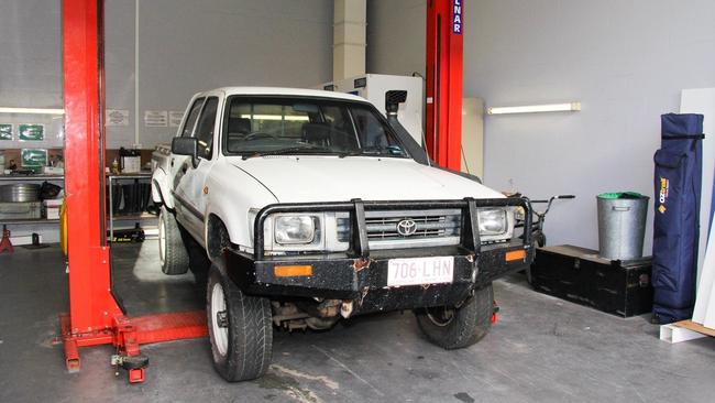 John Peros's Toyota HiLux ute under forensic examination.