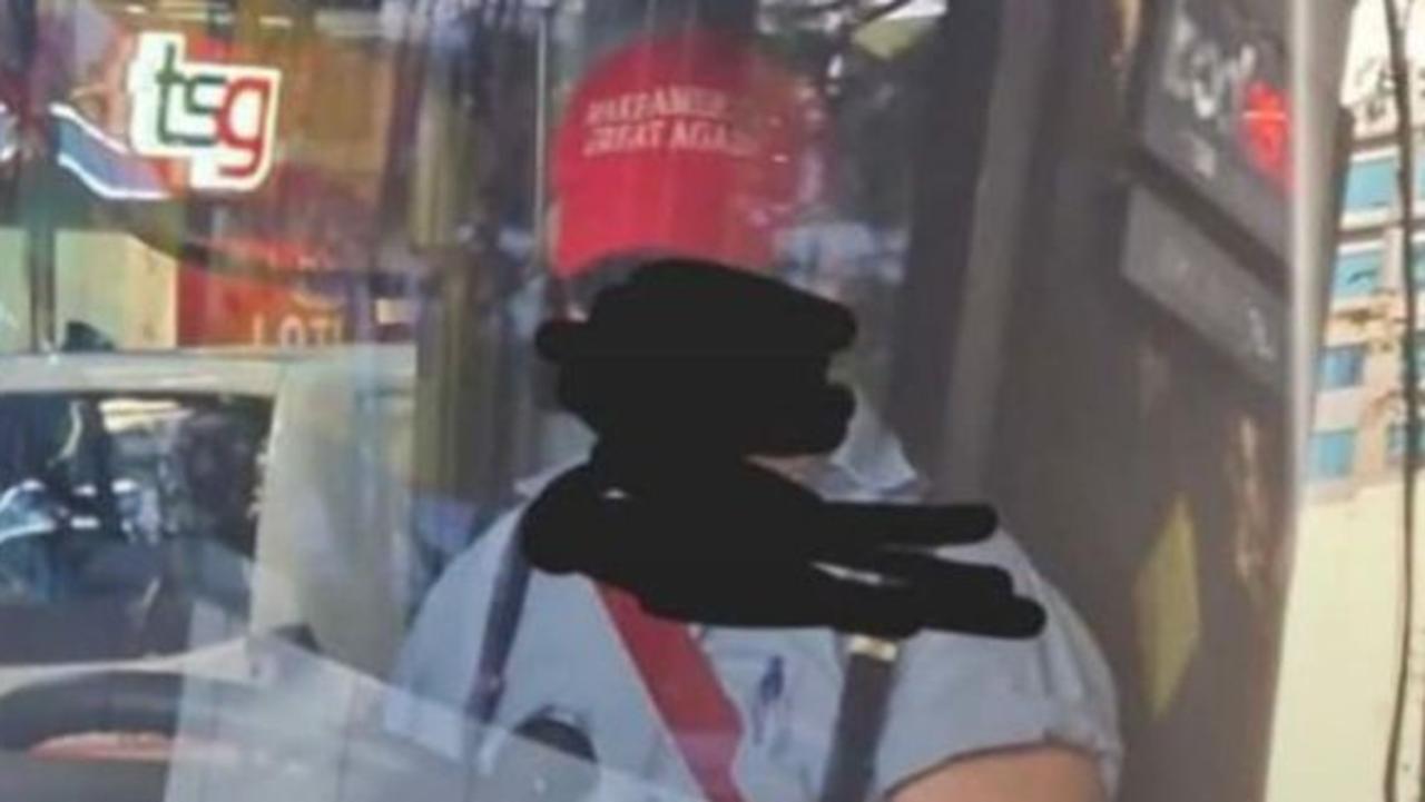 Brisbane bus driver flaunts MAGA hat as tensions rise in union battle