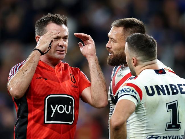SYDNEY, AUSTRALIA - JUNE 15: Referee Chris Butler speaks with Jared Waerea-Hargreaves and roo1 during the round 15 NRL match between Parramatta Eels and Sydney Roosters at CommBank Stadium, on June 15, 2024, in Sydney, Australia. (Photo by Brendon Thorne/Getty Images)