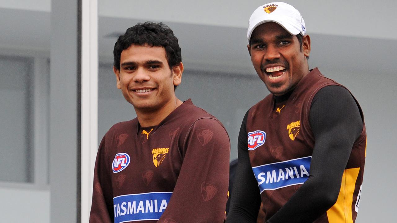 Cyril Rioli and Carl Peterson at Hawks training.