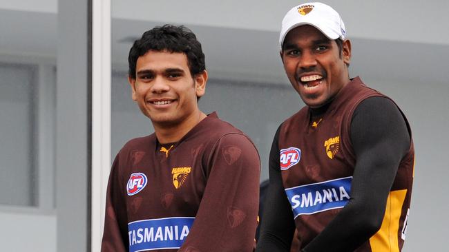 Cyril Rioli and Carl Peterson at Hawks training.