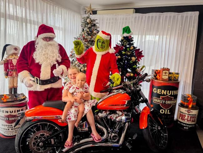 Lexi and Aster Loch with the Grinch and Santa: Bundaberg Harley-Davidson 2023. Sent in by Natalie Loch.