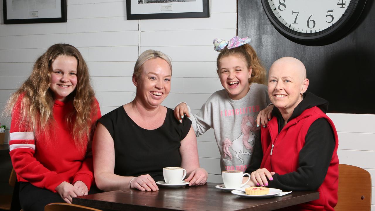 Jenny Barbary from Quartz Cafe on Main South Road in Morphett Vale, S.A. is aiming to raise $6000 for Kristy - who has cancer - and her Daughters, Imogen (red) and Tahlia. (AAP/Emma Brasier)