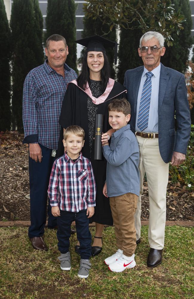 Graduating with a Masters of Education (Distinction) is Katelyn Doyle with family (from left) Jason Allan, Jacob Allan , Eli Allan and Peter Doyle at a UniSQ graduation ceremony at The Empire, Tuesday, June 25, 2024. Picture: Kevin Farmer