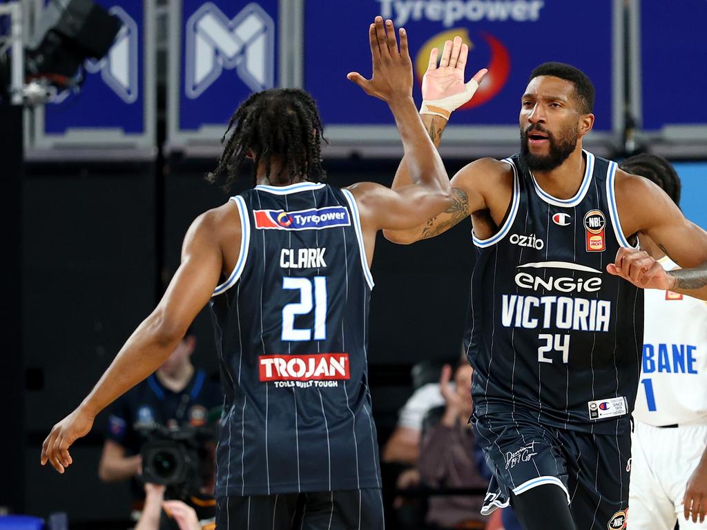 Marcus Lee is congratulated by Ian Clark at John Cain Arena. Picture: Josh Chadwick/Getty Images.