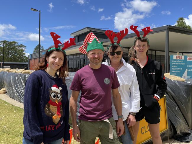 1924 Riverside Steakhouse  staff Lisa Hay, manager Damien O'Riley, Cailyn Sutcliffe and Corey Iredale catch up to finalise preparations as the business closed on Sunday, December 11 ahead of peak River Murray flows. Picture: Dylan Hogarth