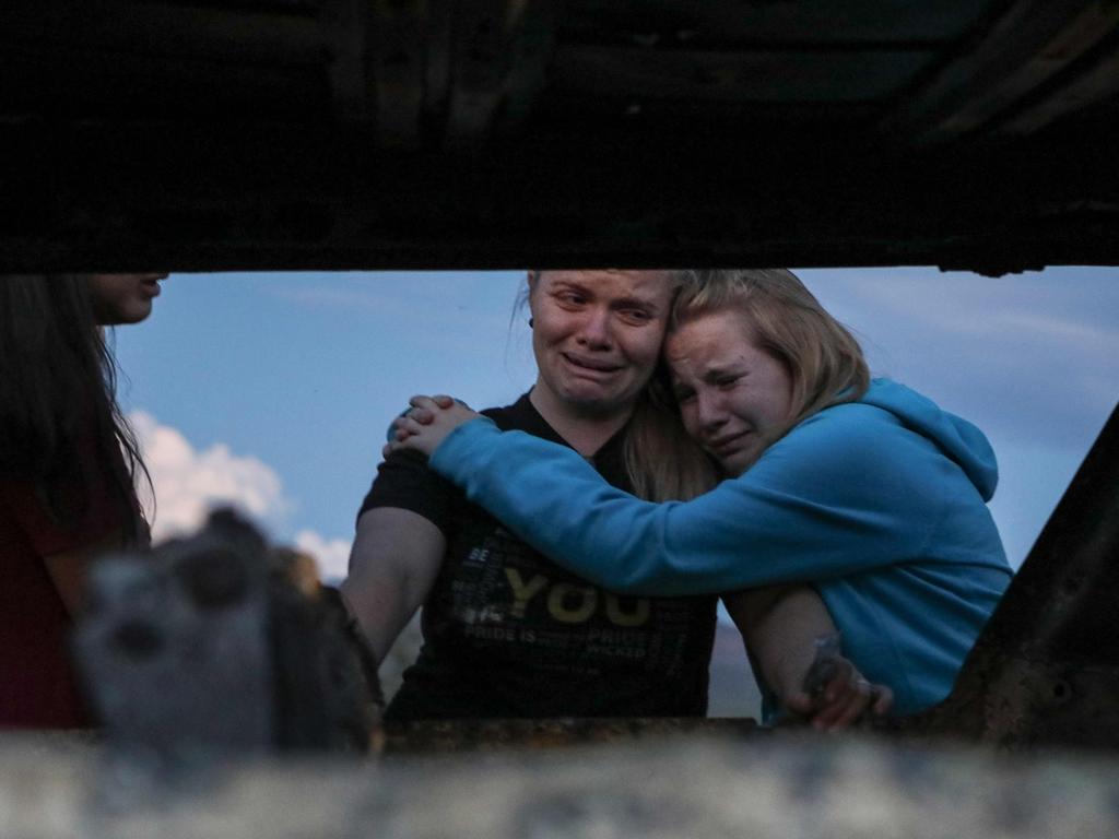 Relatives sobbed at the scene.Picture: Herika Martinez/AFP