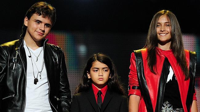 Michael Jackson's children, Prince Jackson (L), Blanket Jackson (C) and Paris Jackson (R) speak on stage during the 'Michael ...