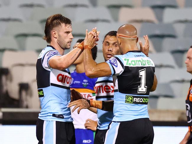 CANBERRA, AUSTRALIA - FEBRUARY 13: Samuel Stonestreet of the Sharks celebrates a try during the round two NRL Pre-Season Challenge match between Canberra Raiders and Cronulla Sutherland Sharks at GIO Stadium on February 13, 2025 in Canberra, Australia. (Photo by Mark Nolan/Getty Images)