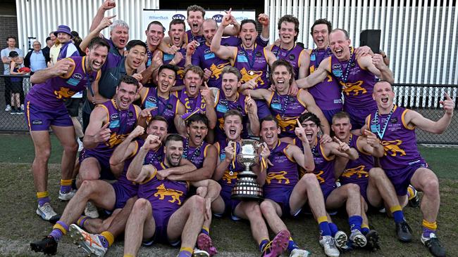 Collegians players celebrate with the winning the VAFA Premier Grand Final. Picture: Andy Brownbill