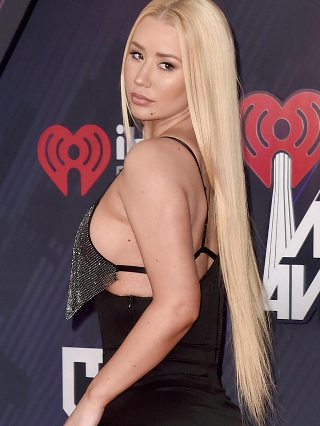 Azalea arrives at the iHeartRadio Music Awards in March.