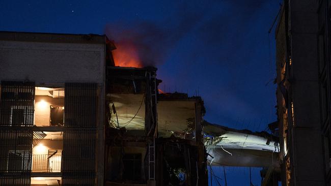 An apartment block ablaze after a missile strike in Dnipro on Friday. Picture: AFP