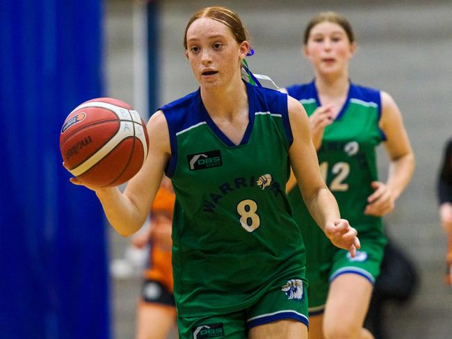 Sianna Adkins of Devonport pushes the ball in her side’s Under 14 Championship division Grand Final win at last year’s state championships. Picture: Simon Sturzaker Photography