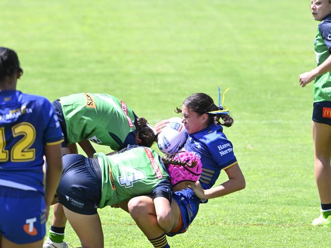 Jade White makes a strong tackle. Picture: Martin Ollman