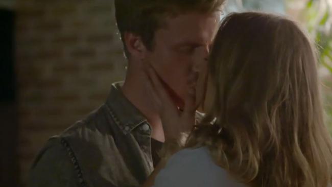 Olena and Richie sneak in a kiss during home visits. Picture: Supplied