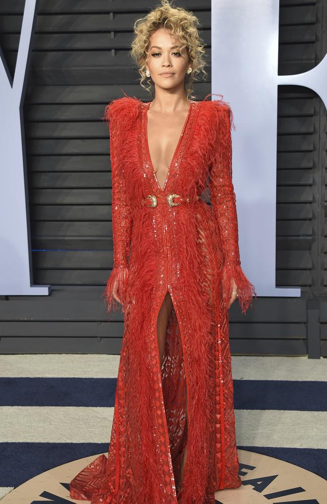 Rita Ora carried on the plunging neckline trend. Picture: Evan Agostini/Invision/AP
