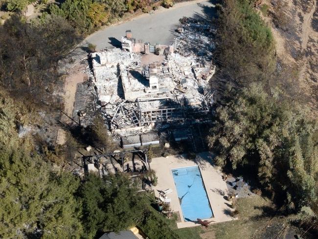 The burnt out foundation of Liam Hemsworth’s Malibu home that was completely destroyed by the Woolsey fire. Picture: Clint Brewer/BACKGRID