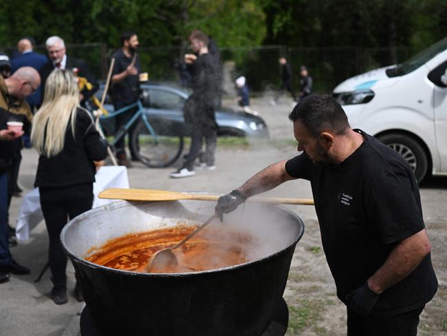 A volunteer prepares a soup, as usually provided by the US-based food charity World Central Kitchen. Picture: AFP