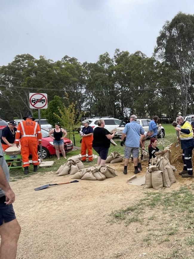 Locals sandbagging to protect their properties from flood impact. Picture: Facebook