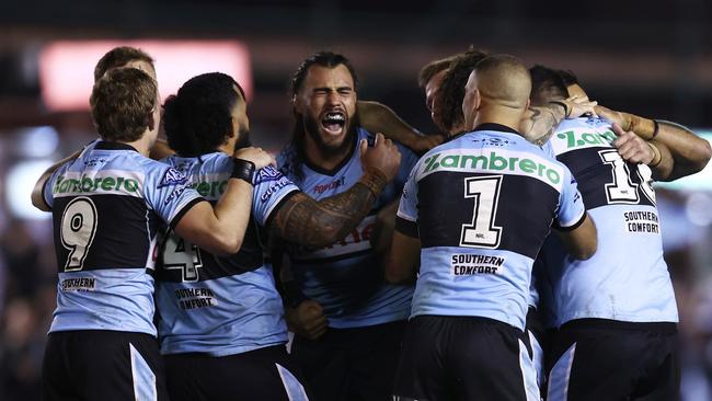 Nicho Hynes of the Sharks celebrates with his teammates. Photo by Matt King/Getty Images